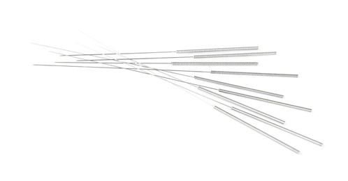 Many needles for acupuncture on white background