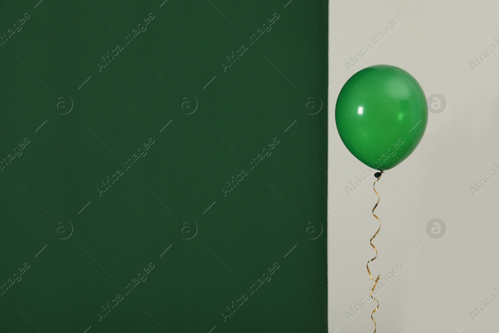 Photo of Bright balloon on color background, space for text. Celebration time