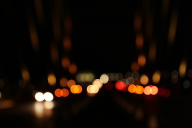 Blurred view of city lights at night. Bokeh effect