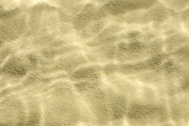 Photo of Sand under water as background, top view