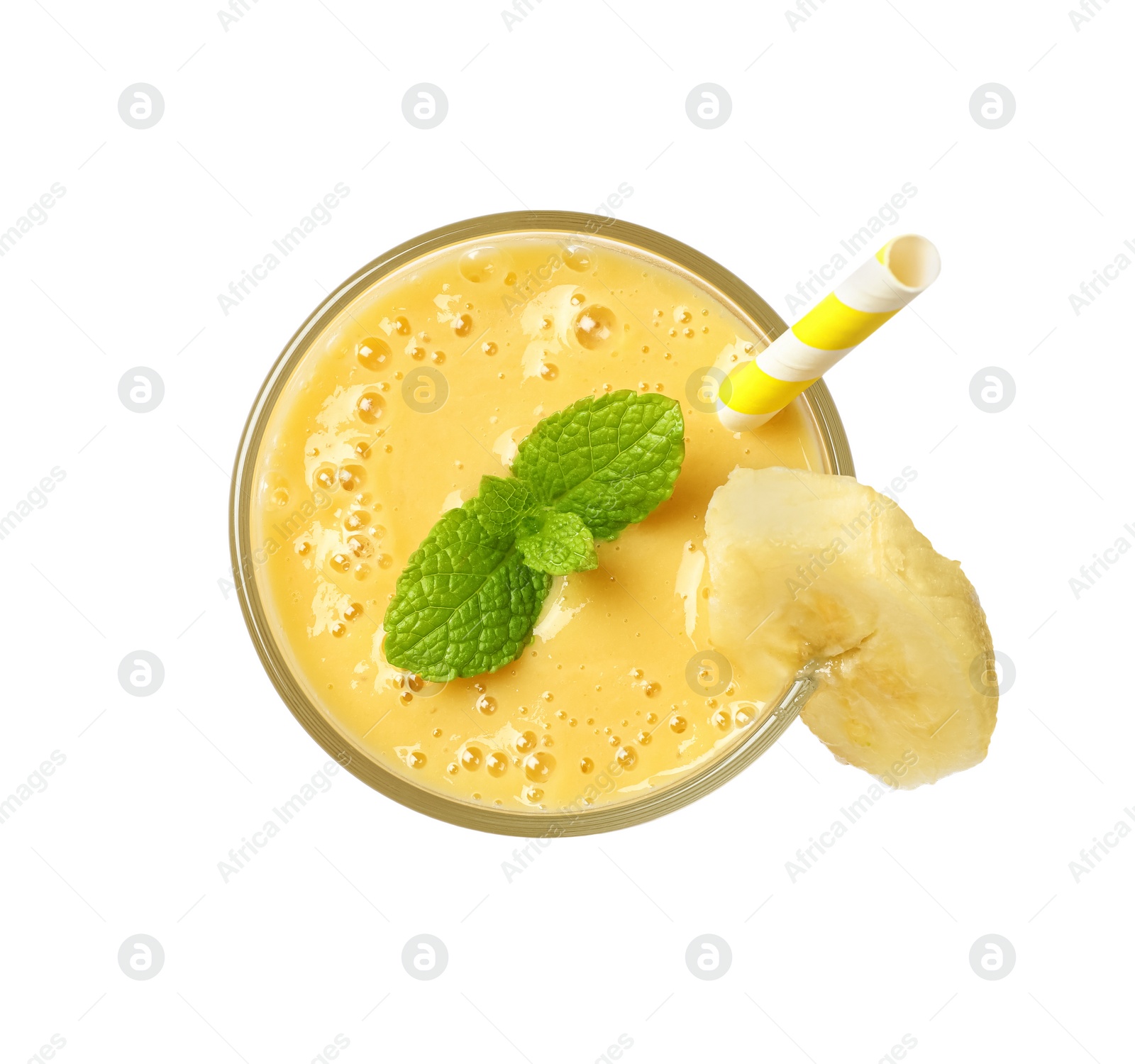 Photo of Glass of tasty banana smoothie isolated on white, top view