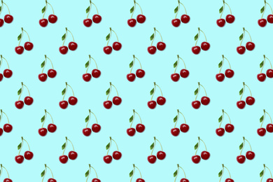 Image of Pattern of cherries on pale light blue background