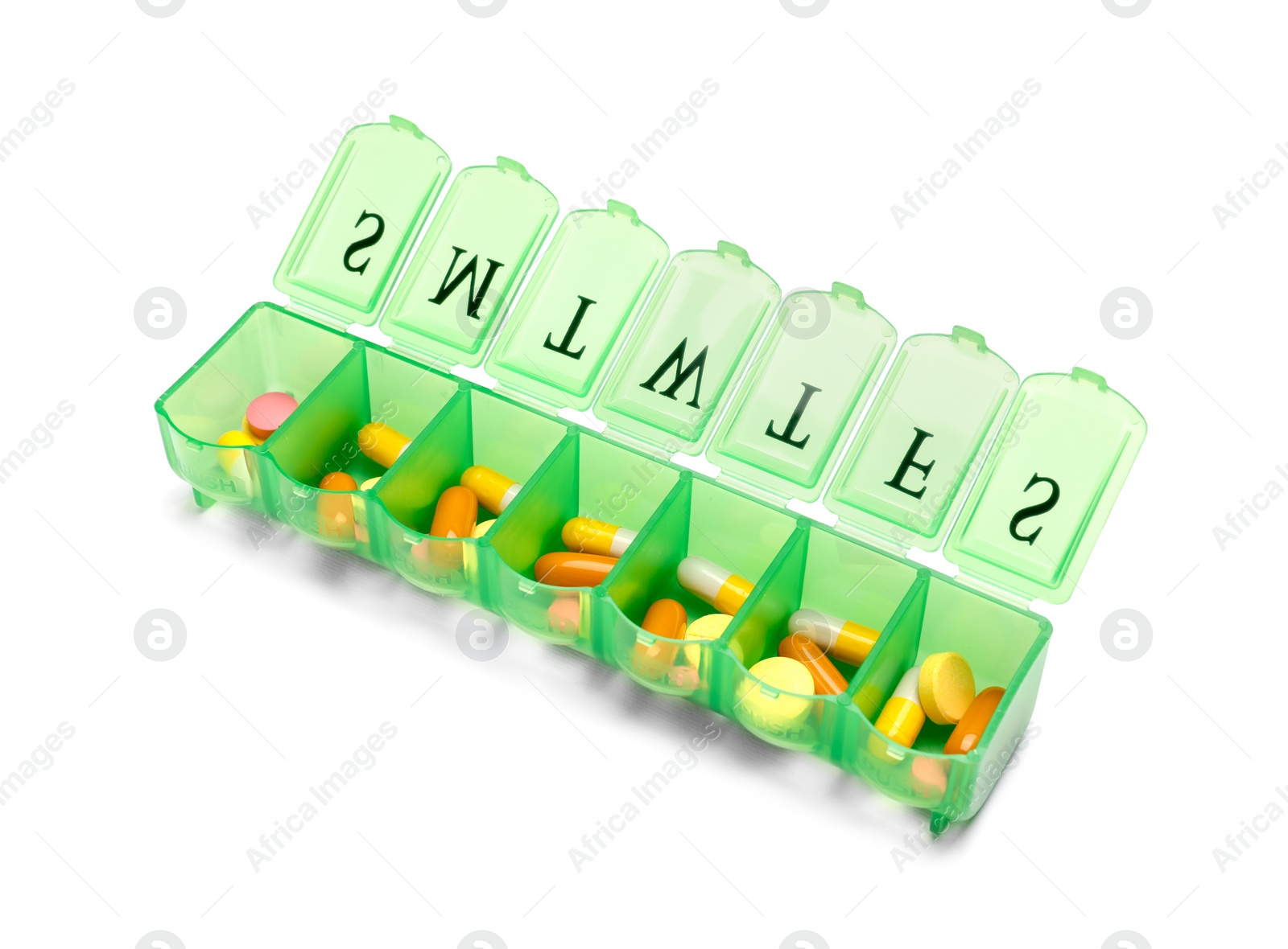 Photo of Different pills in organizer isolated on white