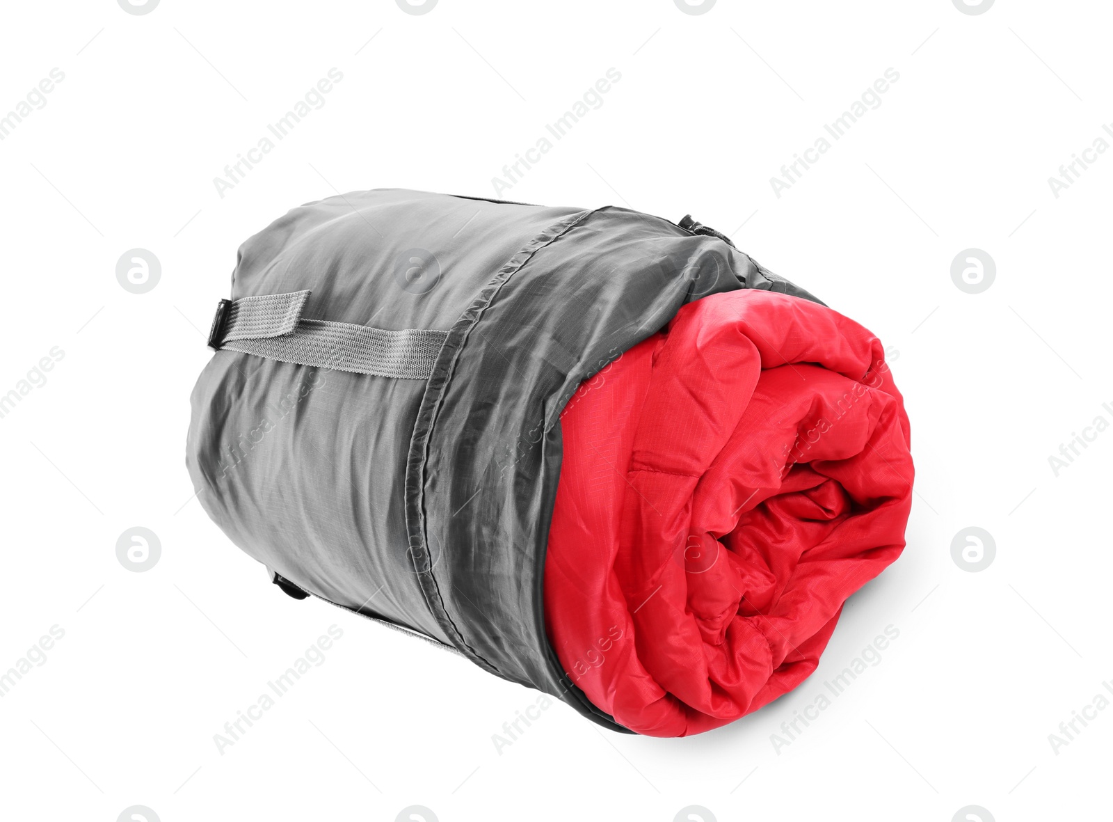 Photo of Rolled sleeping bag on white background. Camping equipment