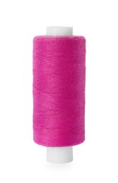 Photo of Spool of pink sewing thread isolated on white