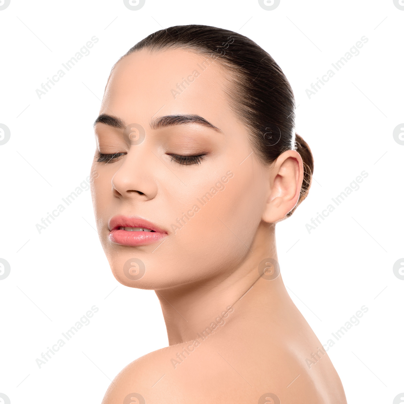 Photo of Portrait of young woman with beautiful face and natural makeup on white background