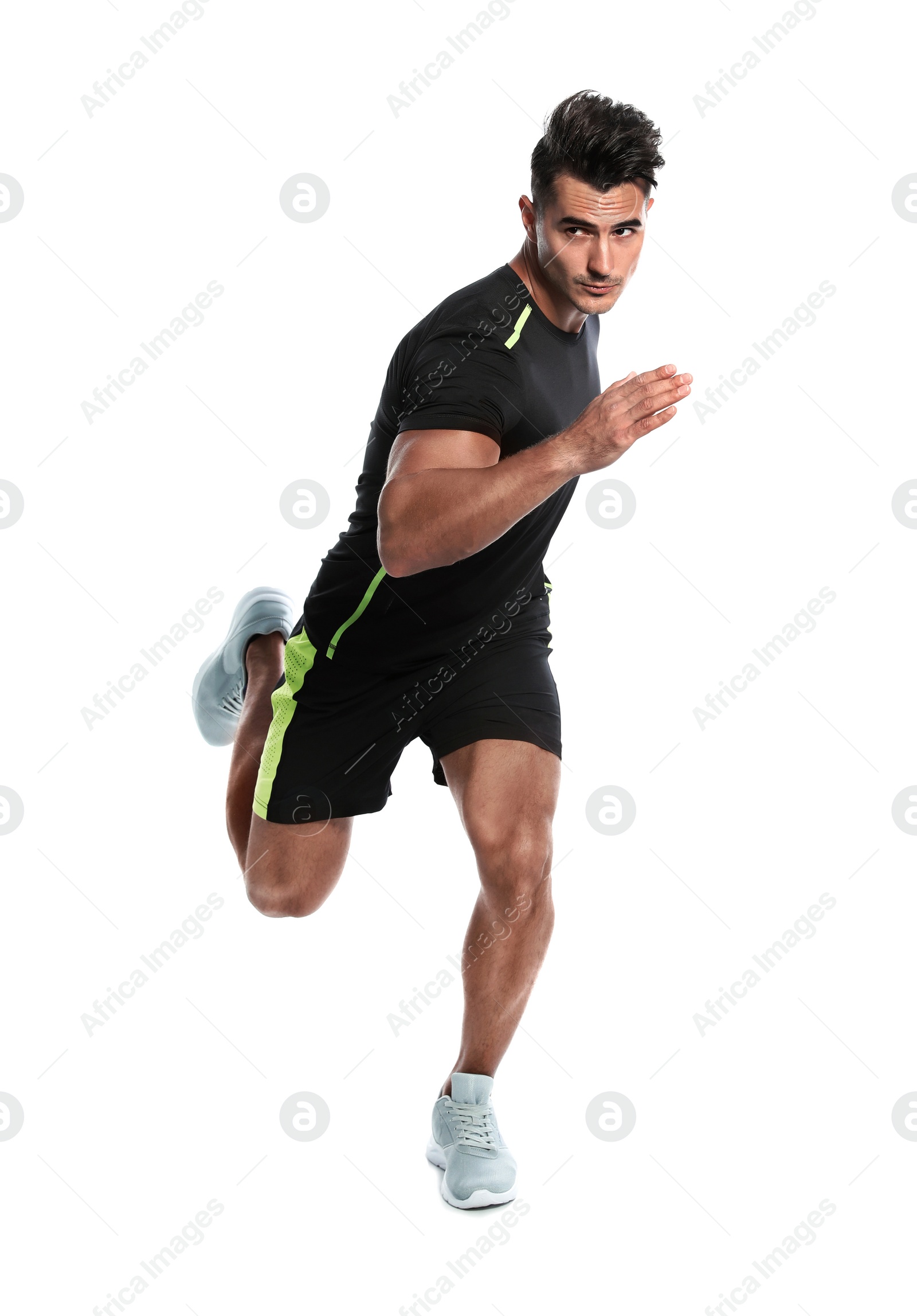 Photo of Sporty young man running on white background