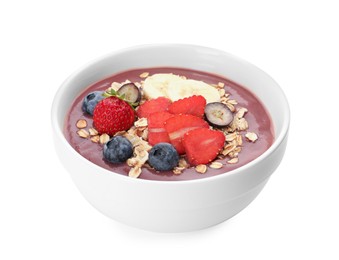 Photo of Delicious smoothie bowl with fresh berries, banana and granola on white background
