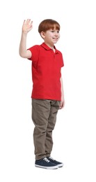 Smiling little boy waving hand on white background