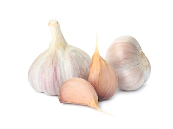 Photo of Fresh organic garlic bulbs and cloves on white background