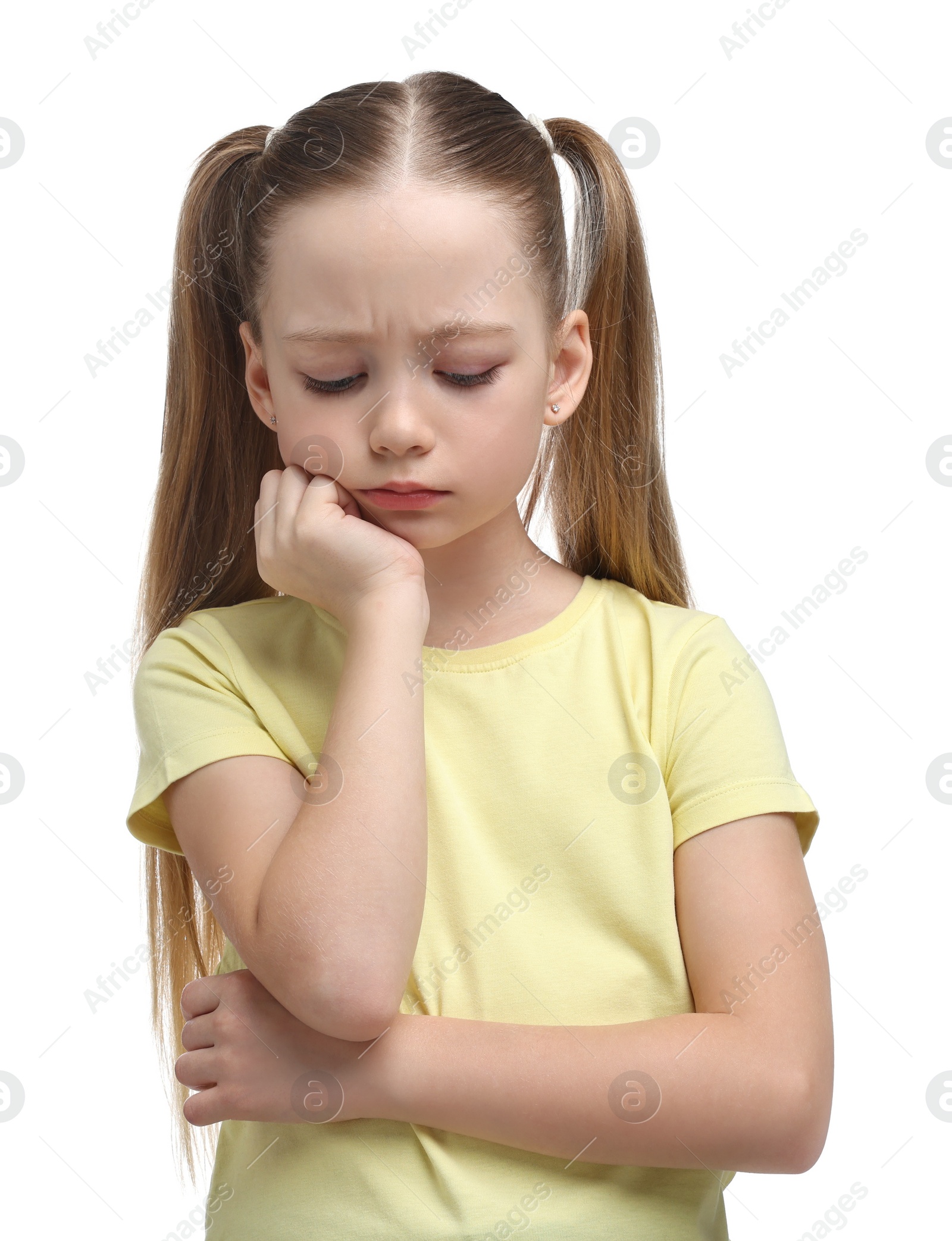 Photo of Portrait of sad girl on white background
