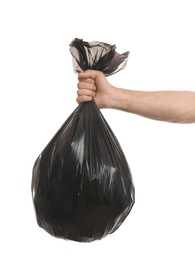 Man holding full garbage bag on white background, closeup