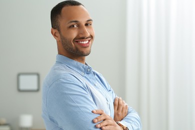 Photo of Portrait of handsome young man at home
