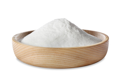 Photo of Baking soda in wooden bowl isolated on white