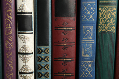 Photo of Collection of different old books as background