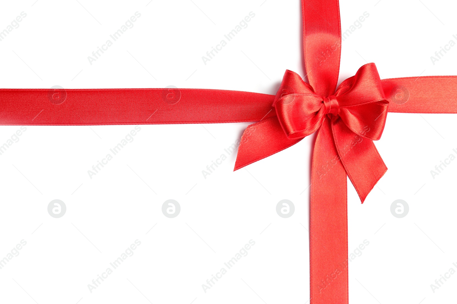 Photo of Red ribbons with bow on white background, top view