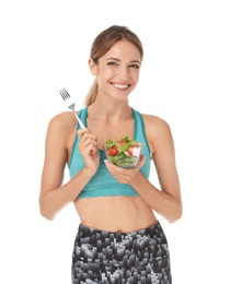 Photo of Happy slim woman in sportswear with salad on white background. Weight loss diet