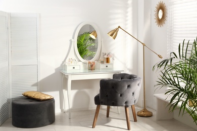 Photo of Stylish room interior with elegant dressing table