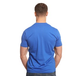 Man wearing blue t-shirt on white background, back view. Mockup for design