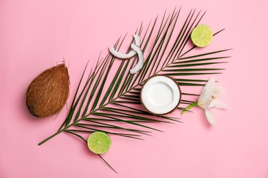 Photo of Composition with coconut milk and fresh nuts on color background, top view