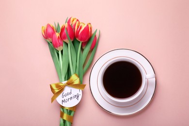 Photo of Cup of coffee, beautiful tulips and card with text Good Morning on beige background, flat lay