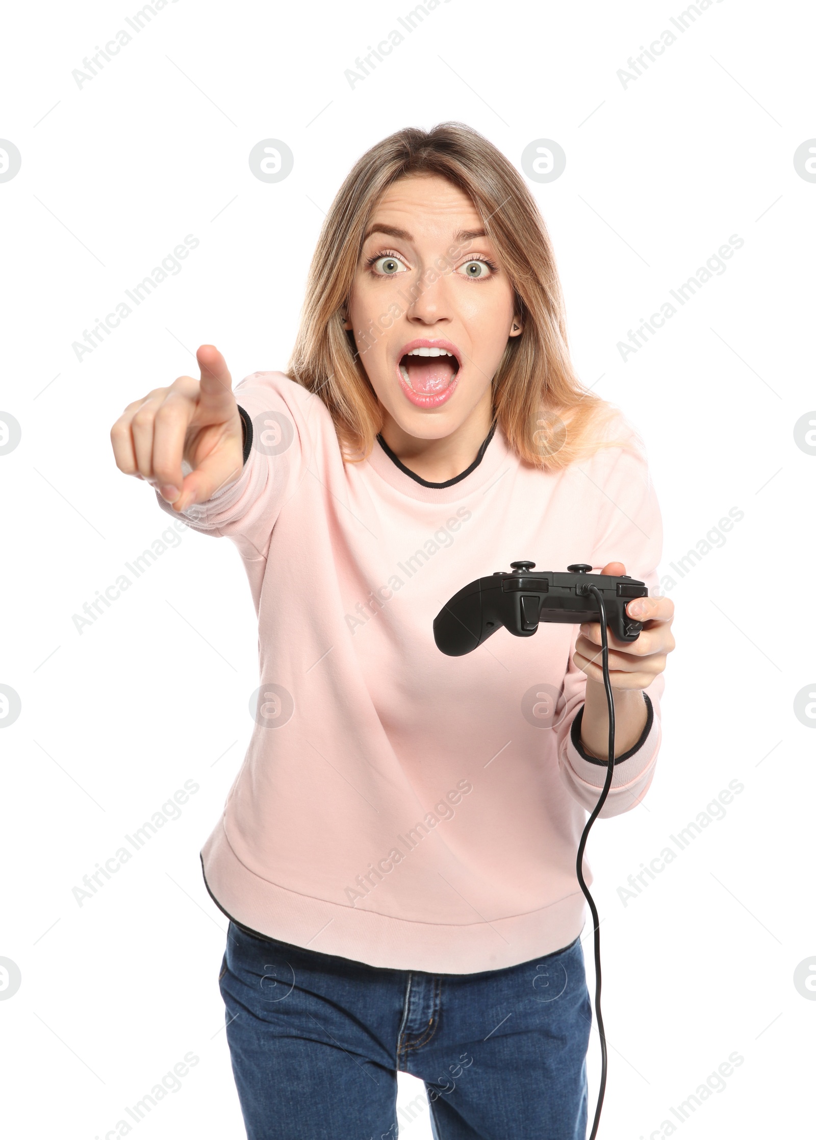 Photo of Emotional young woman playing video games with controller isolated on white