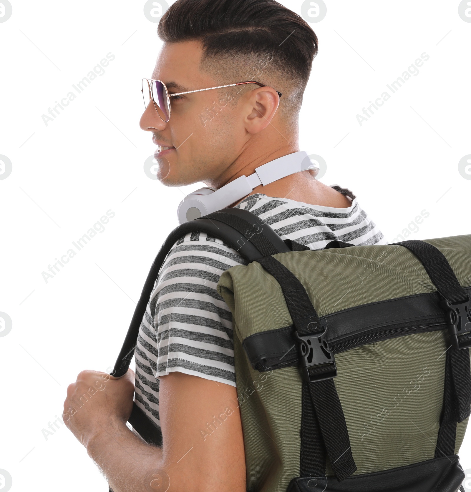 Photo of Man with backpack and headphones on white background. Summer travel