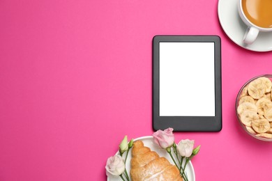 Photo of E-book reader with breakfast and flowers on pink background, flat lay. Space for text