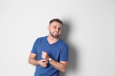 Portrait of handsome happy man on white background