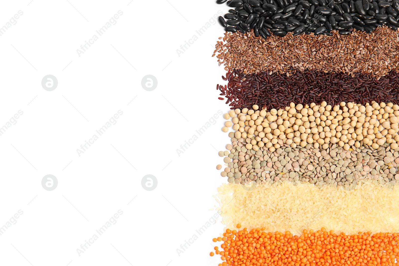 Photo of Various raw veggie seeds on white background, top view