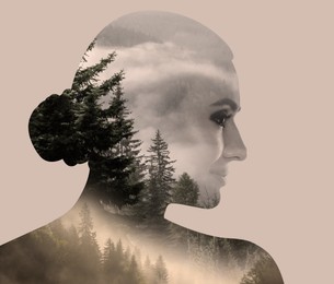 Image of Double exposure of beautiful woman and forest in foggy mountains