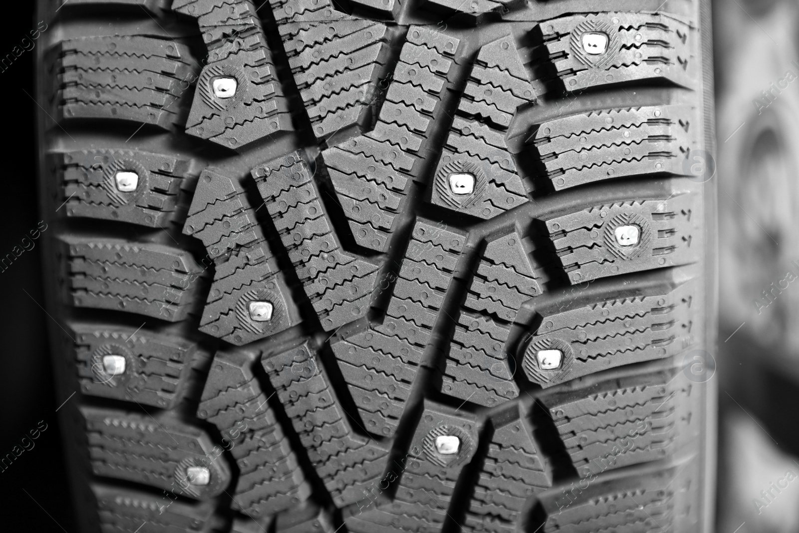 Photo of Car tire in auto store, closeup view