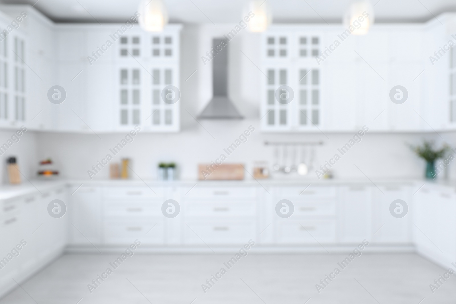 Photo of Blurred view of modern stylish kitchen interior