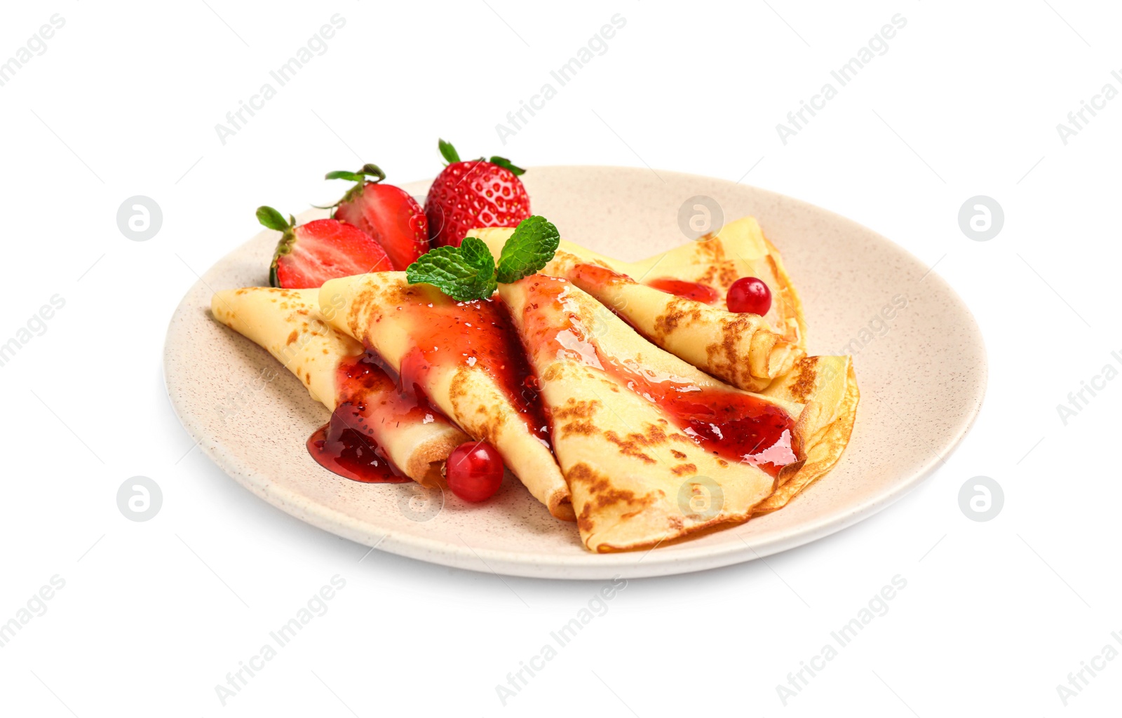 Photo of Delicious thin pancakes with strawberries and jam isolated on white