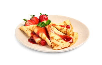 Photo of Delicious thin pancakes with strawberries and jam isolated on white