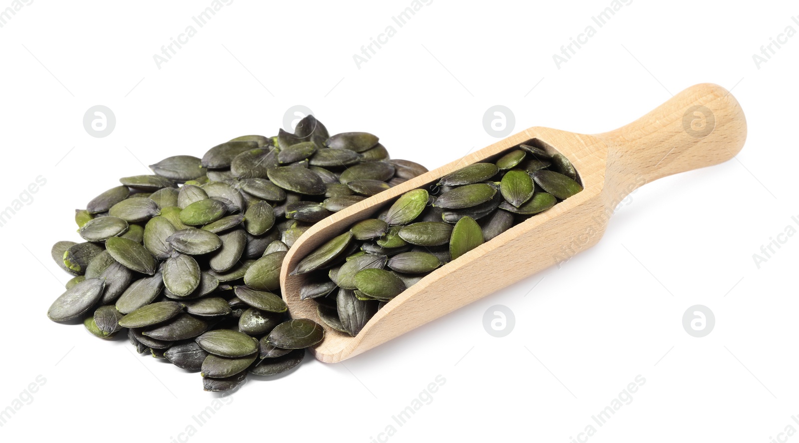 Photo of Wooden scoop and pumpkin seeds isolated on white