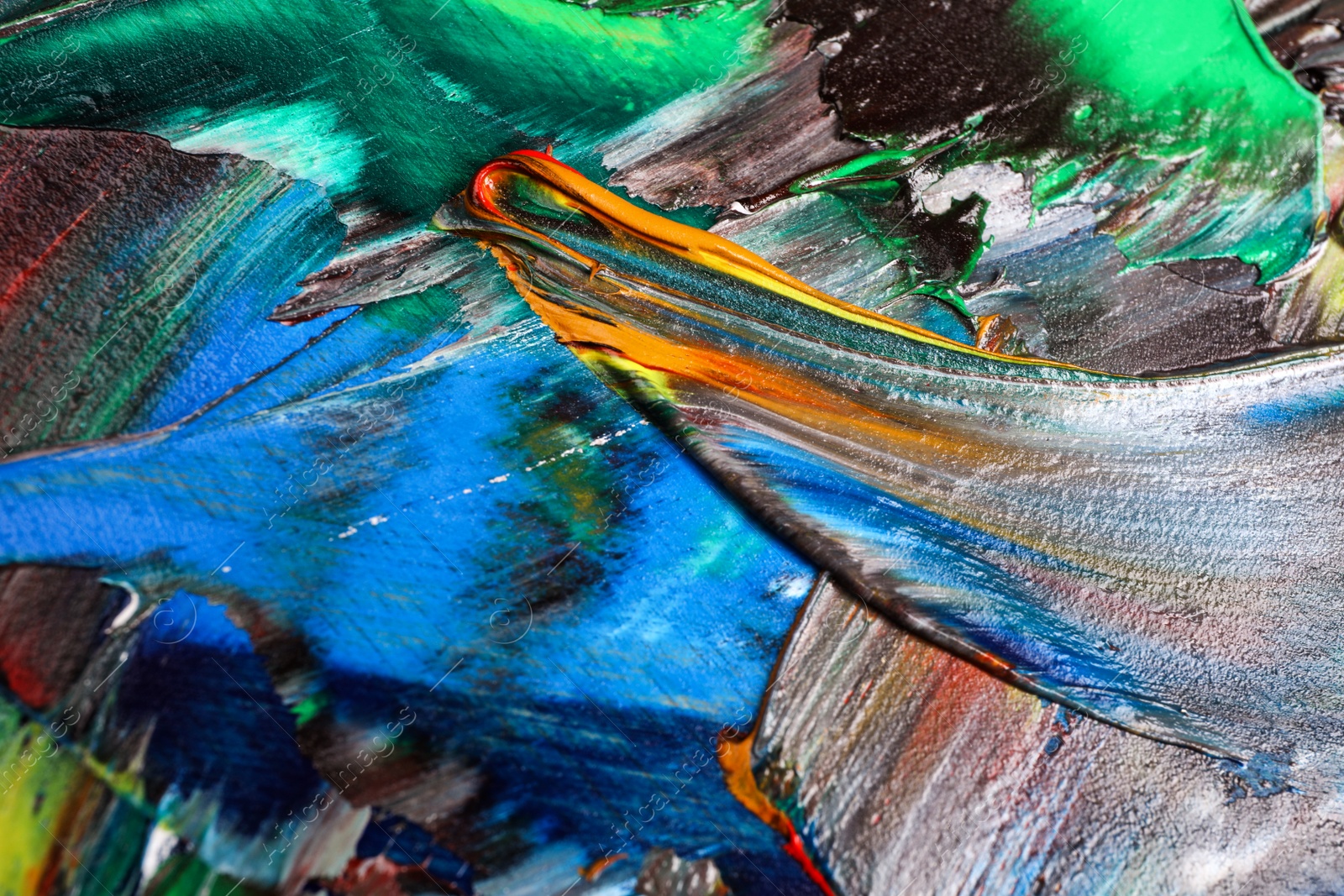 Photo of Abstract colorful acrylic paint as background, top view