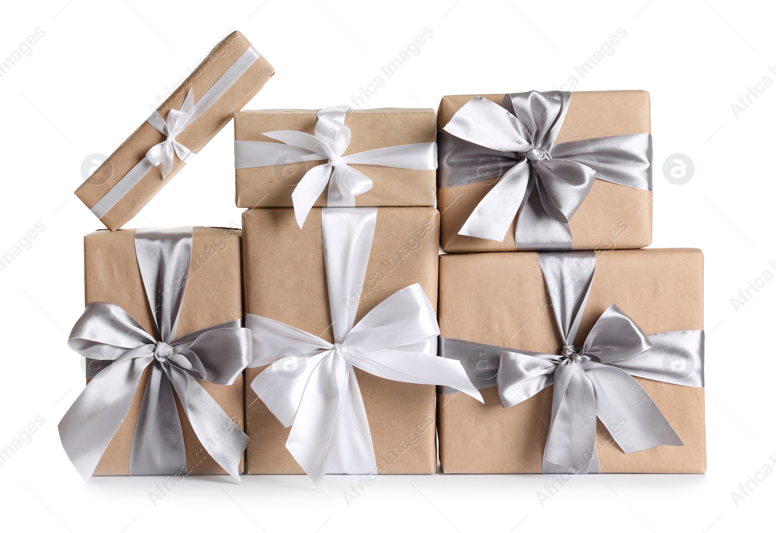 Photo of Beautifully wrapped gift boxes on white background