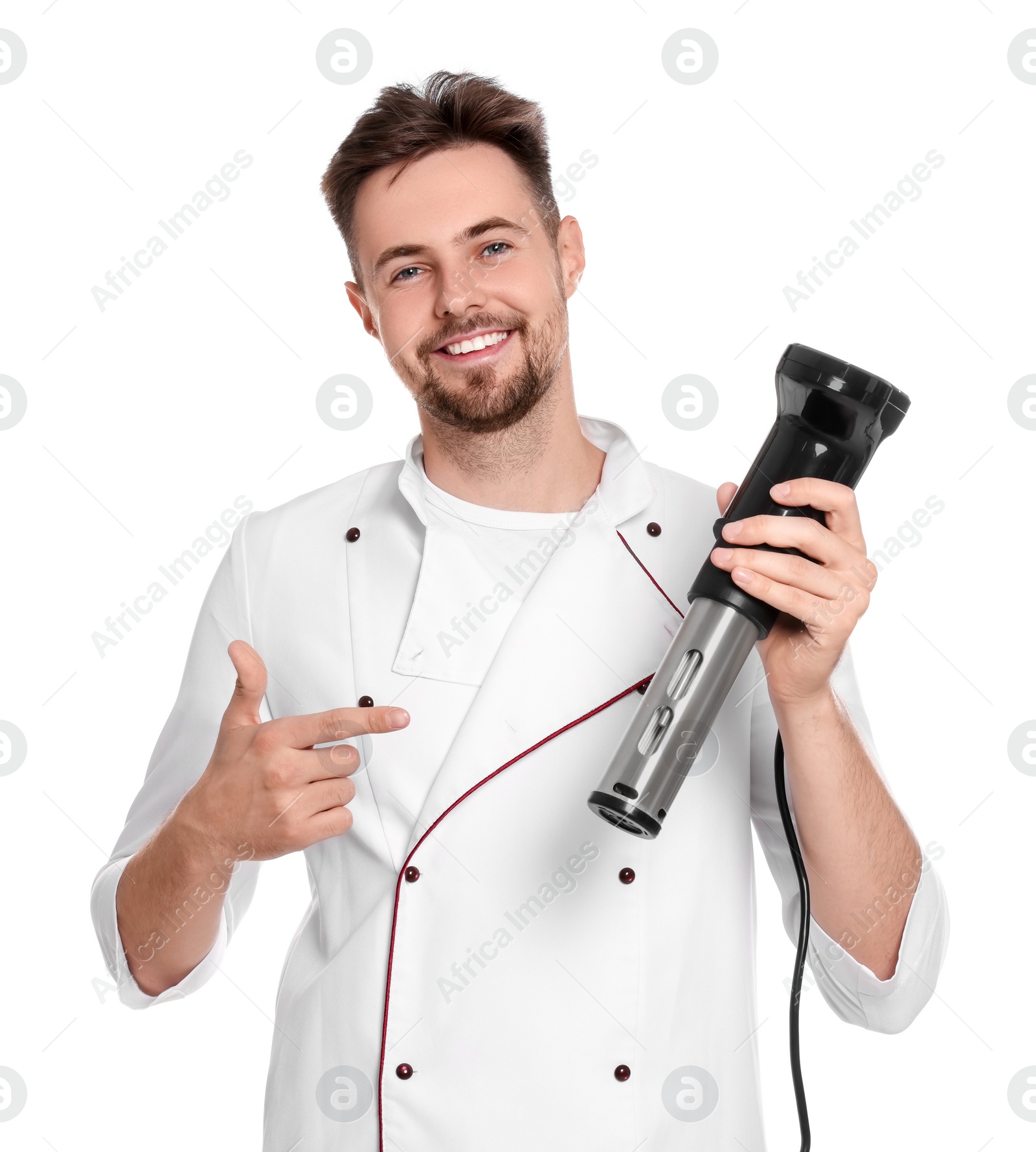 Photo of Smiling chef pointing on sous vide cooker against white background