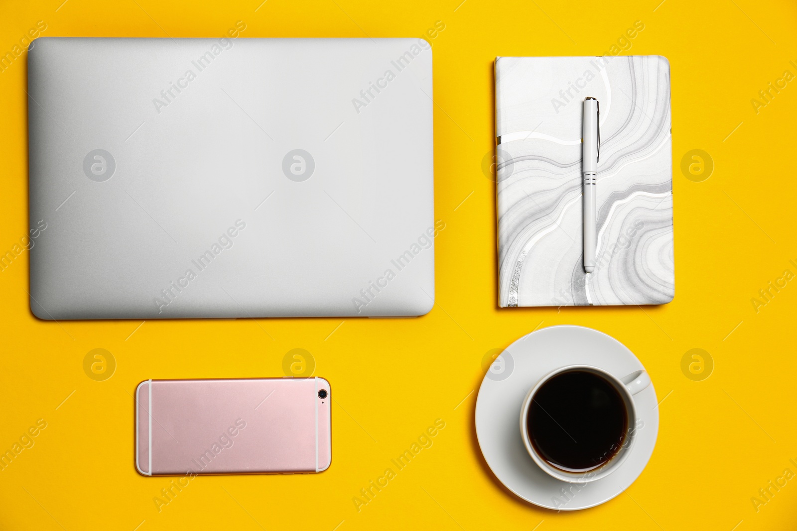 Photo of Flat lay composition with modern laptop on yellow background