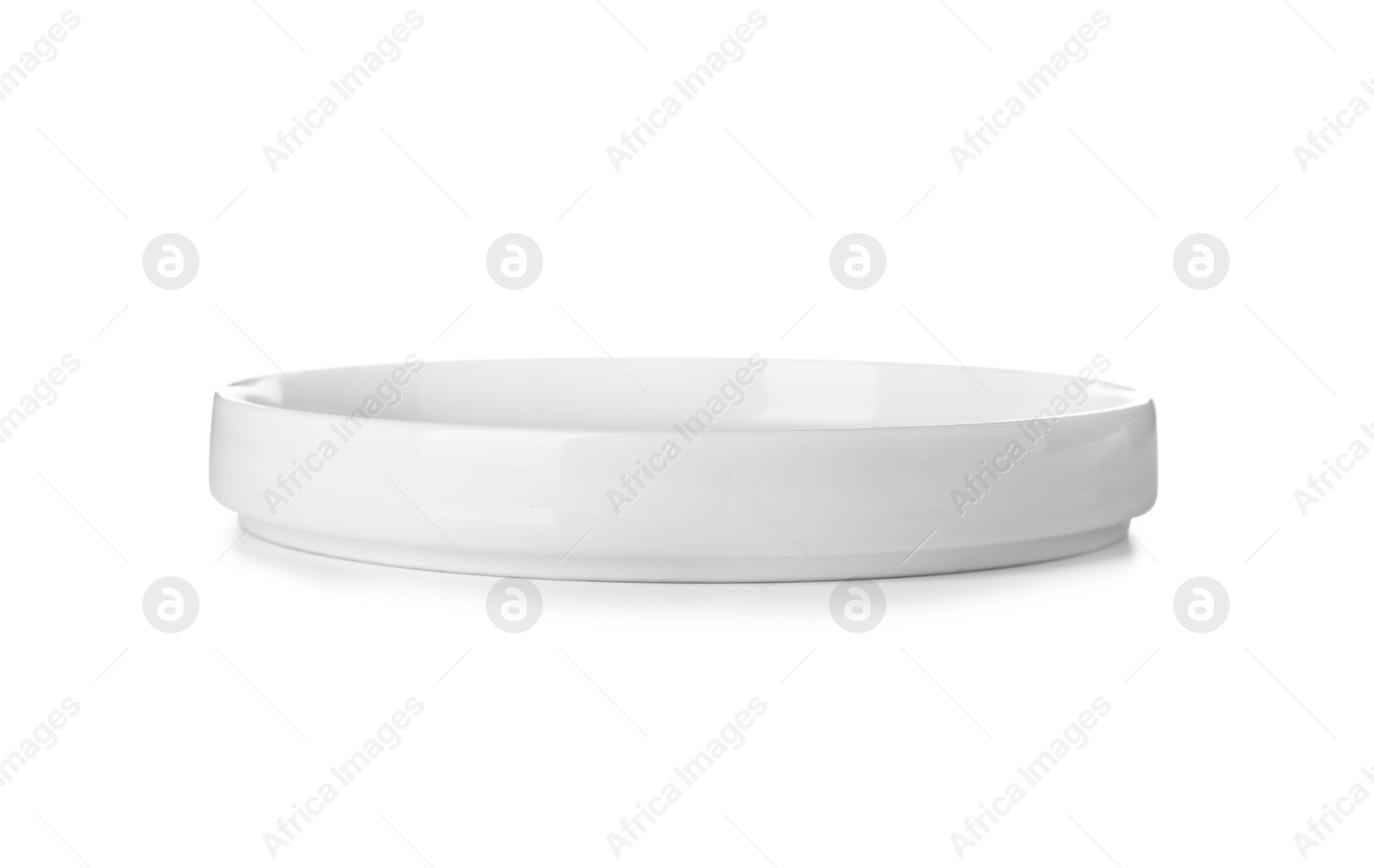 Photo of Ceramic plate on white background. Washing dishes