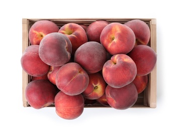 Photo of Crate of delicious ripe peaches isolated on white, top view