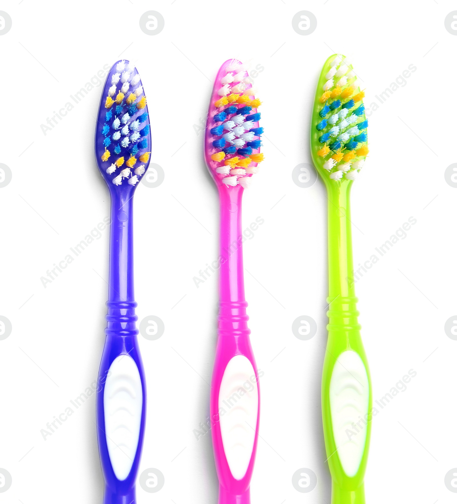 Photo of Color toothbrushes on white background. Dental care