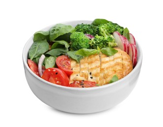 Photo of Healthy meal. Delicious chicken, vegetables and spinach in bowl isolated on white