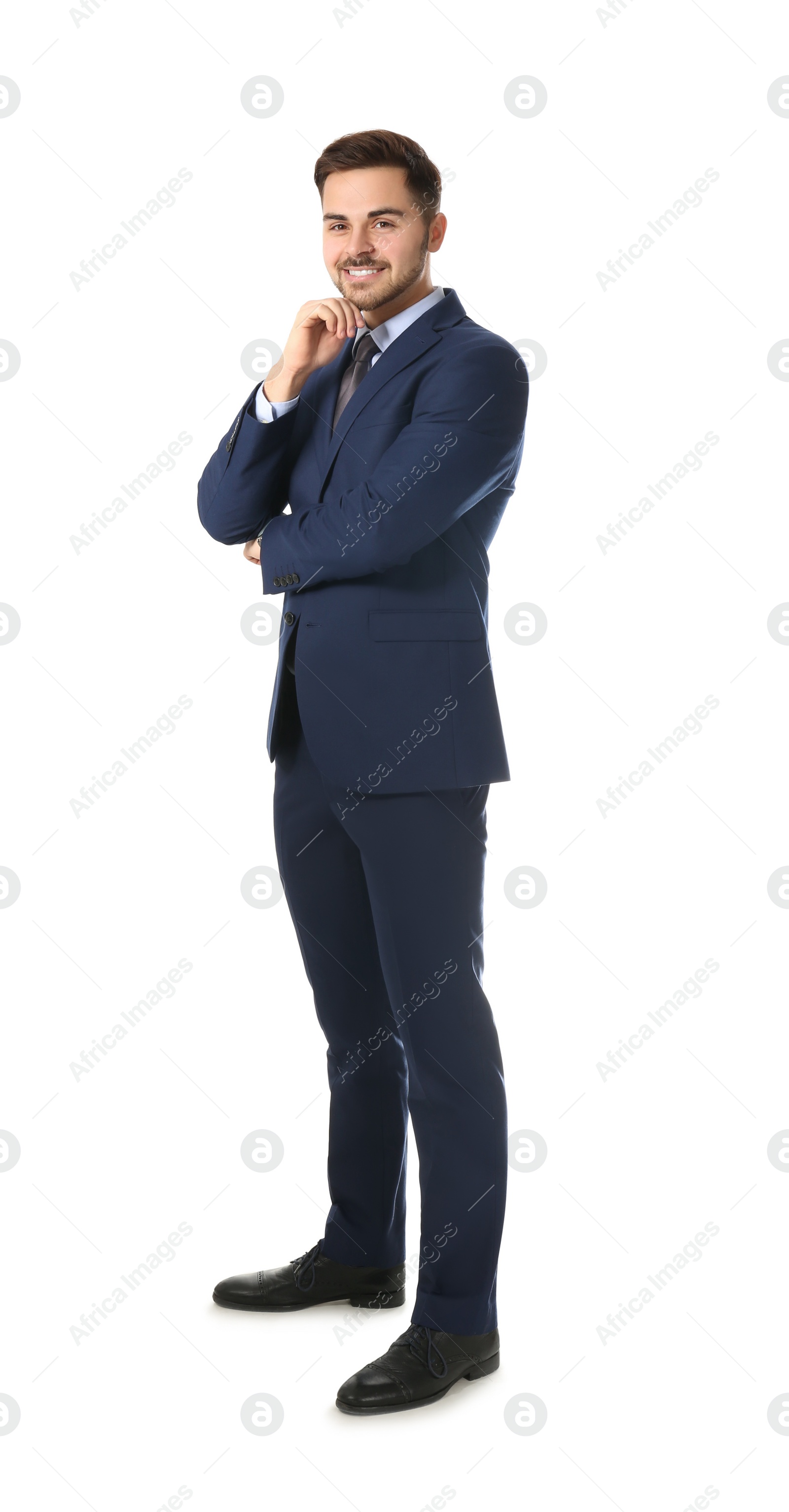 Photo of Full length portrait of businessman posing on white background