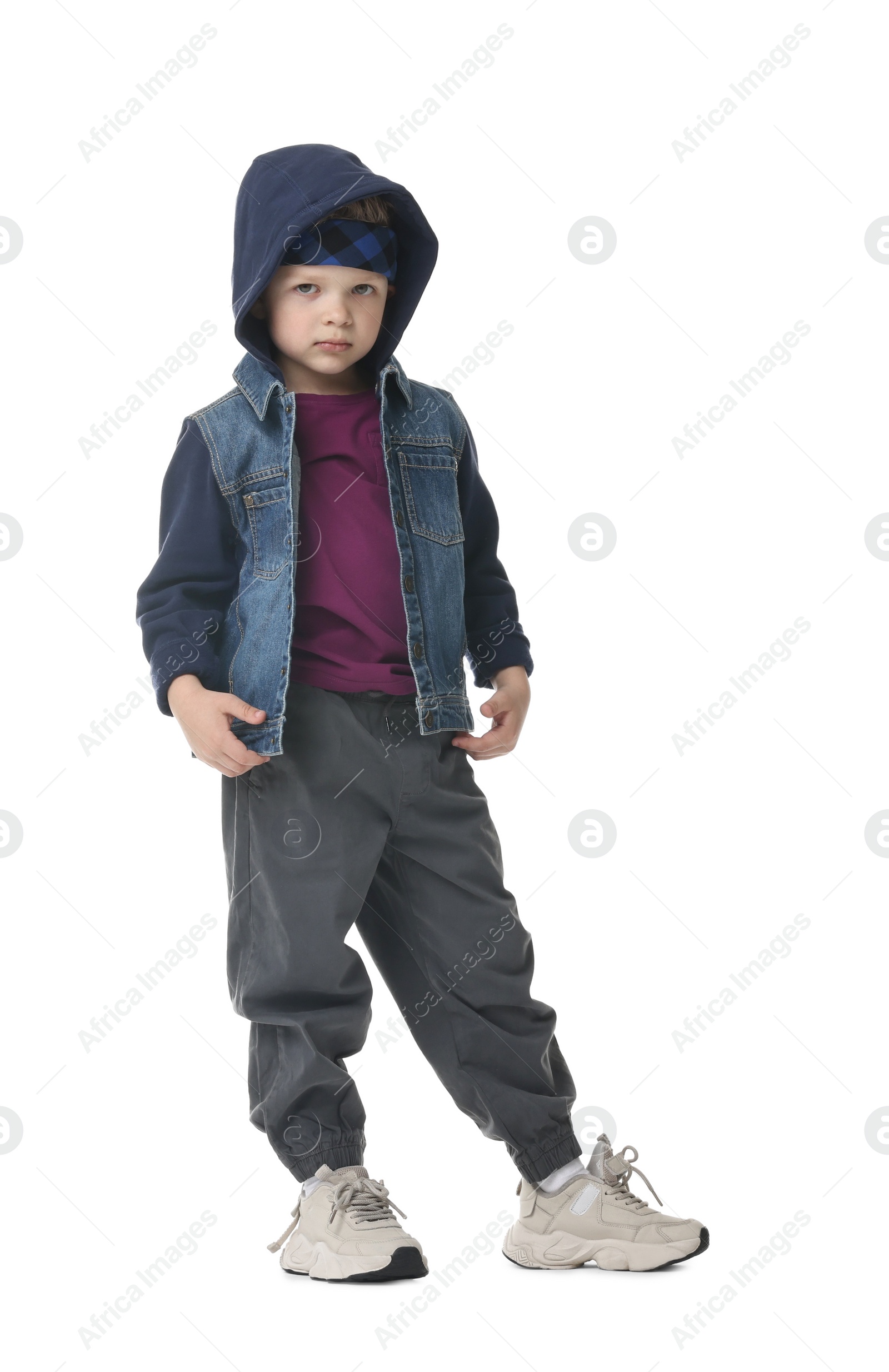 Photo of Happy little boy dancing on white background