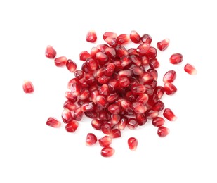 Photo of Pile of tasty pomegranate grains isolated on white, top view