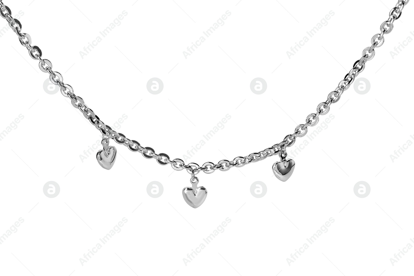 Photo of One metal chain with heart pendants isolated on white. Luxury jewelry