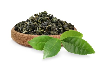 Dry green tea and fresh leaves on white background 