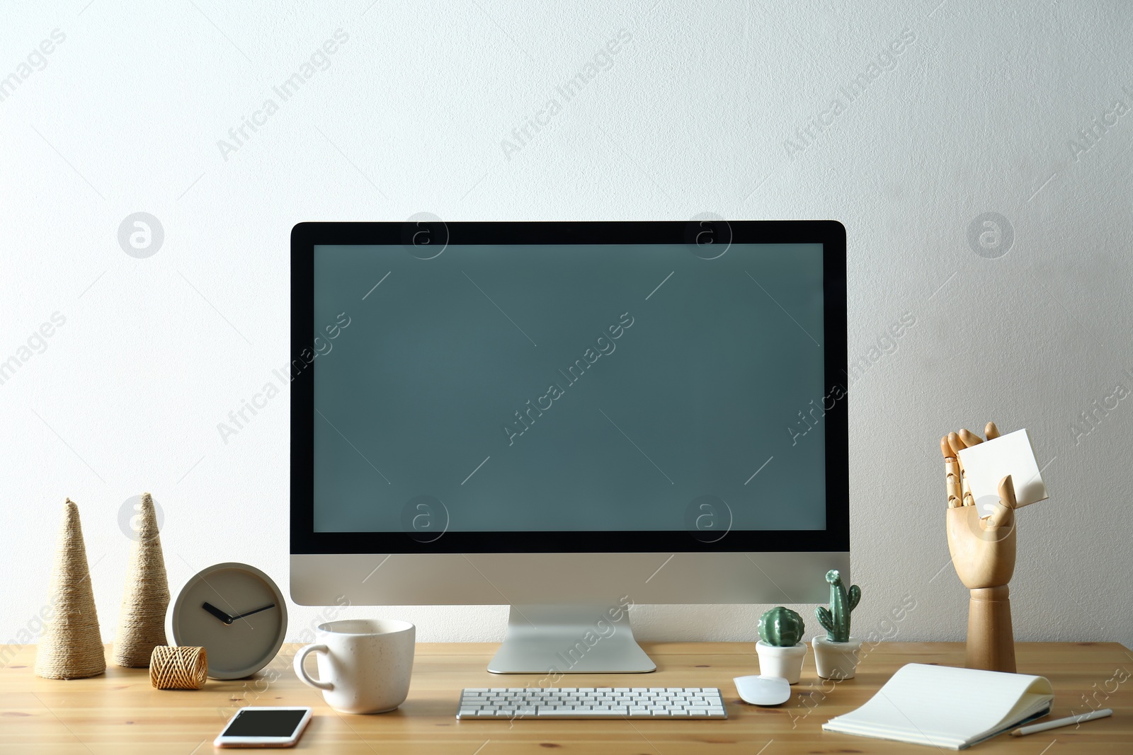 Photo of Modern computer and office supplies on wooden table, space for text. Designer's workplace